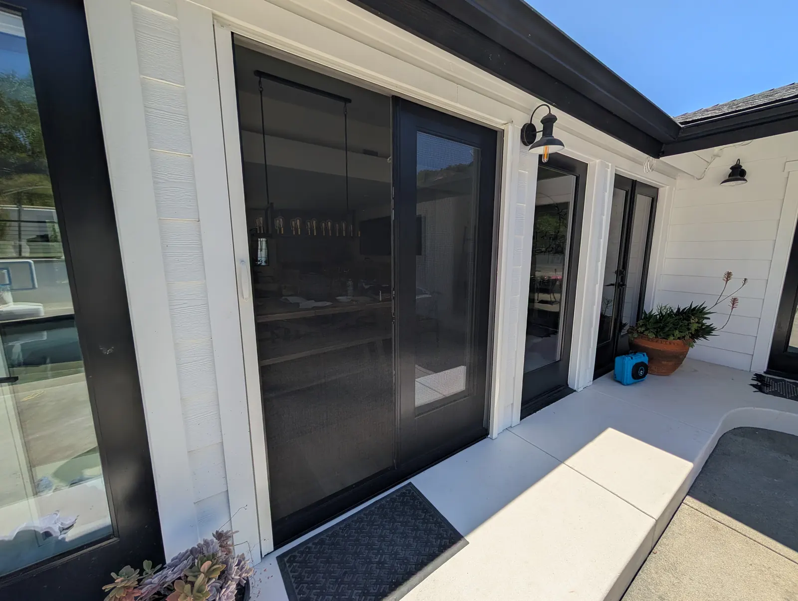 Double retractable screen panels on a wide sliding door, Escondido, CA