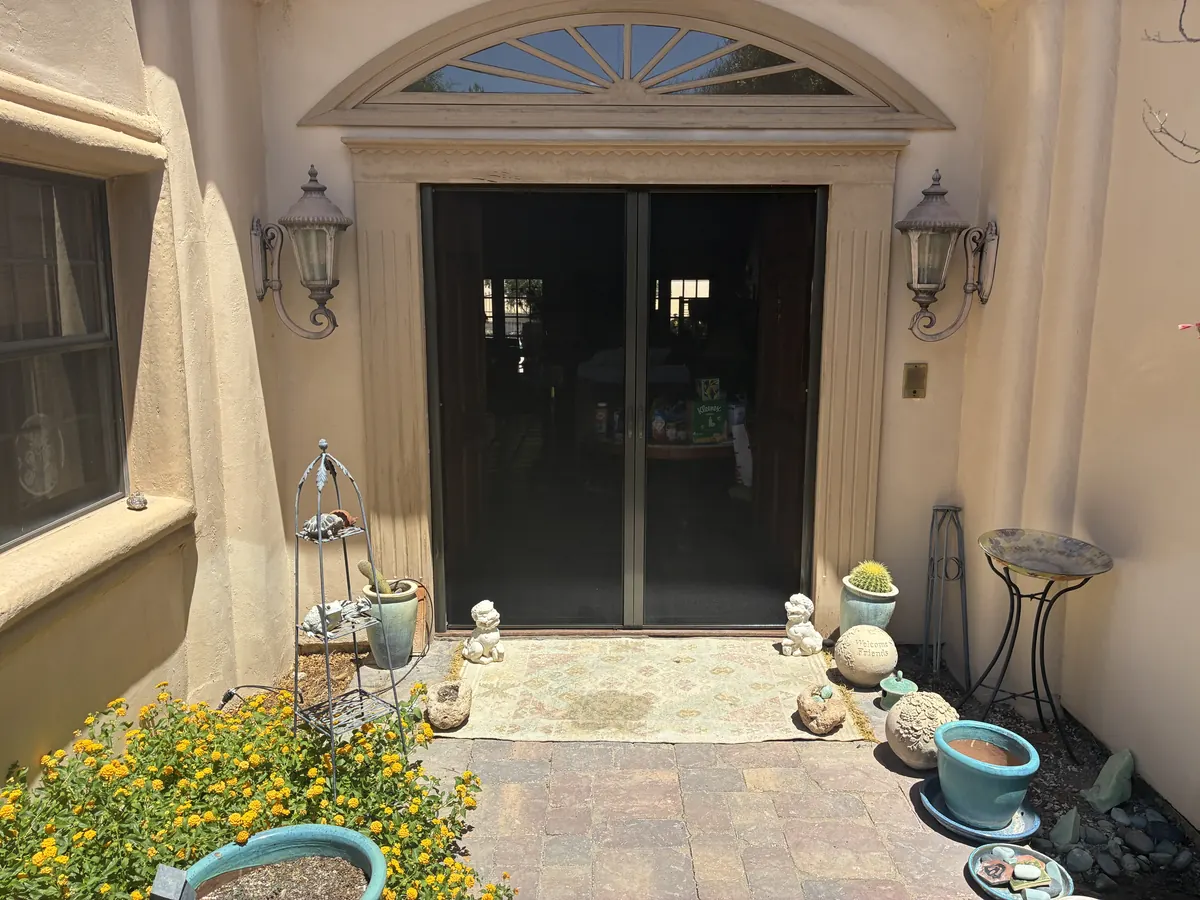 Apollo retractable French door screens closed on double wood doors, Green Valley, NV
