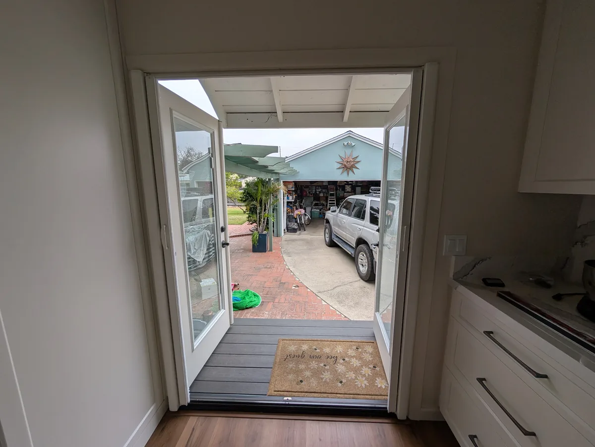 Retractable French door screen installed on a patio door, La Mesa, CA