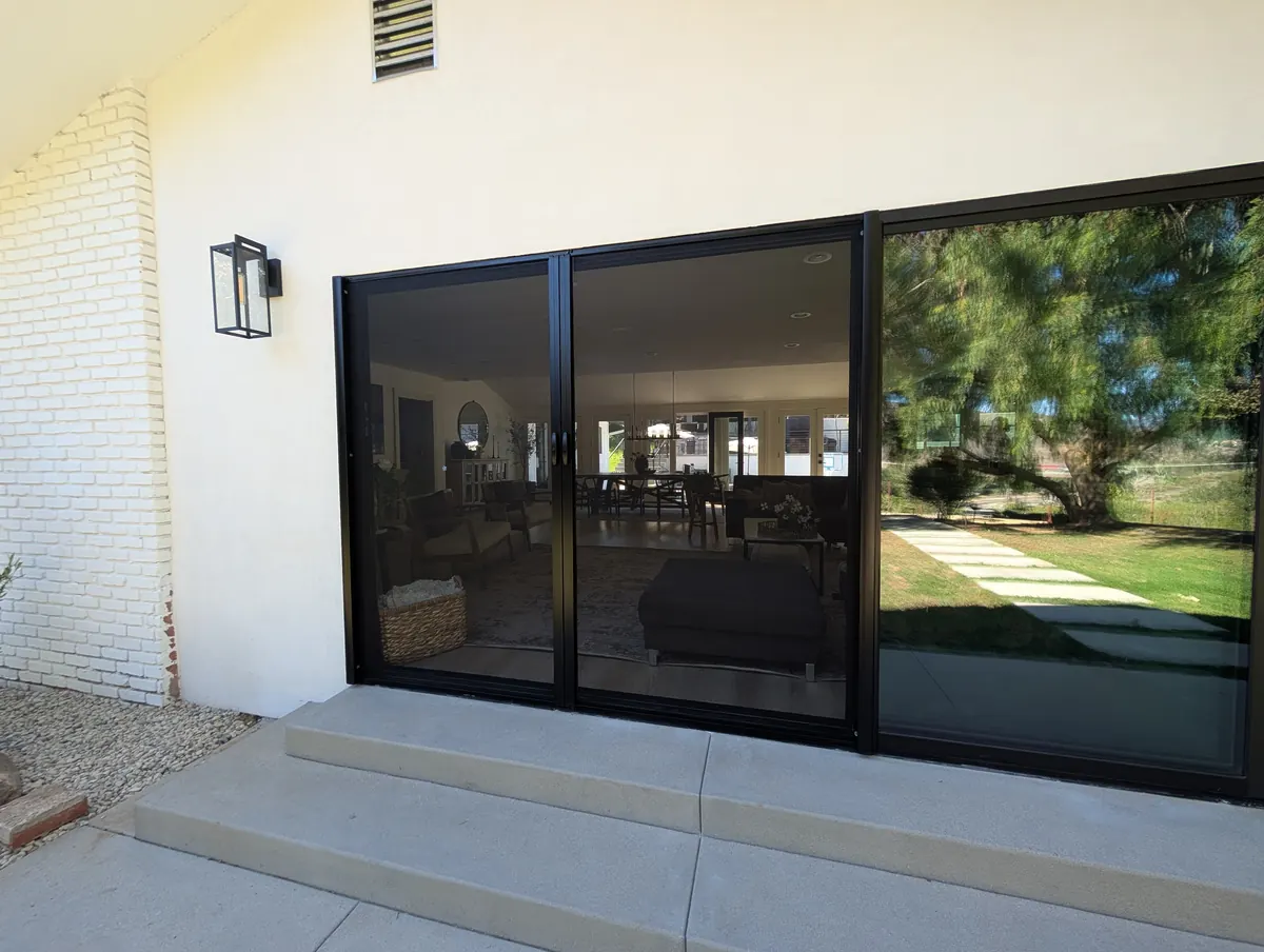 Retractable sliding screen door installed on a sliding glass door, Escondido, CA