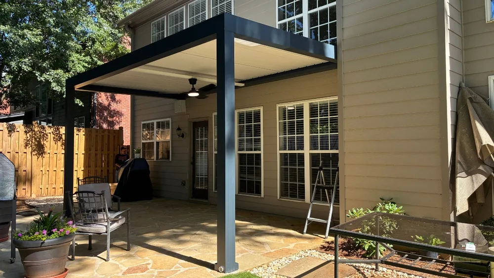 Underside of an Atlas louvered roof with closed louvers and a ceiling fan, Smyrna GA install
