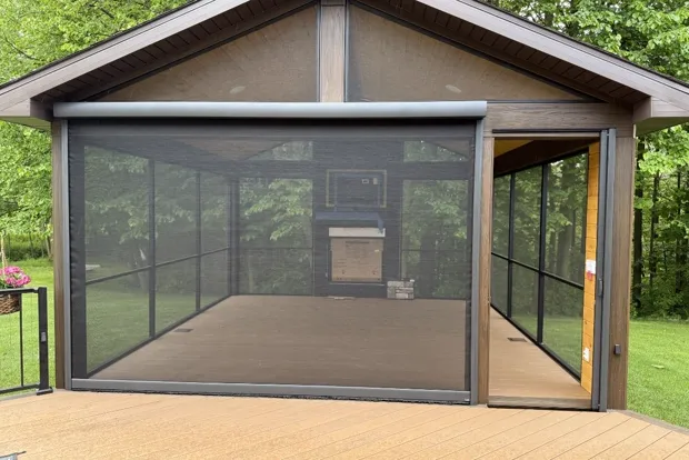 Fully screened porch enclosure with graphite mesh and screen door