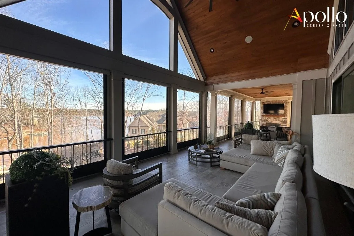 Screened-in patio using a retractable motorized screen for bug-free outdoor living